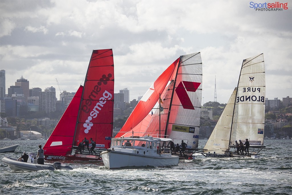 An amazing finish for these 3 skiffs with Smeg finishing only 1 sec ahead of Gotta Luv it 7 in race day 4 - 18ft Skiff JJ Giltinan Championships 2013 - Day 4  © Beth Morley - Sport Sailing Photography http://www.sportsailingphotography.com
